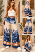 Mountain print border wide-leg trousers with contrasting border detail, elasticated waist and side pockets