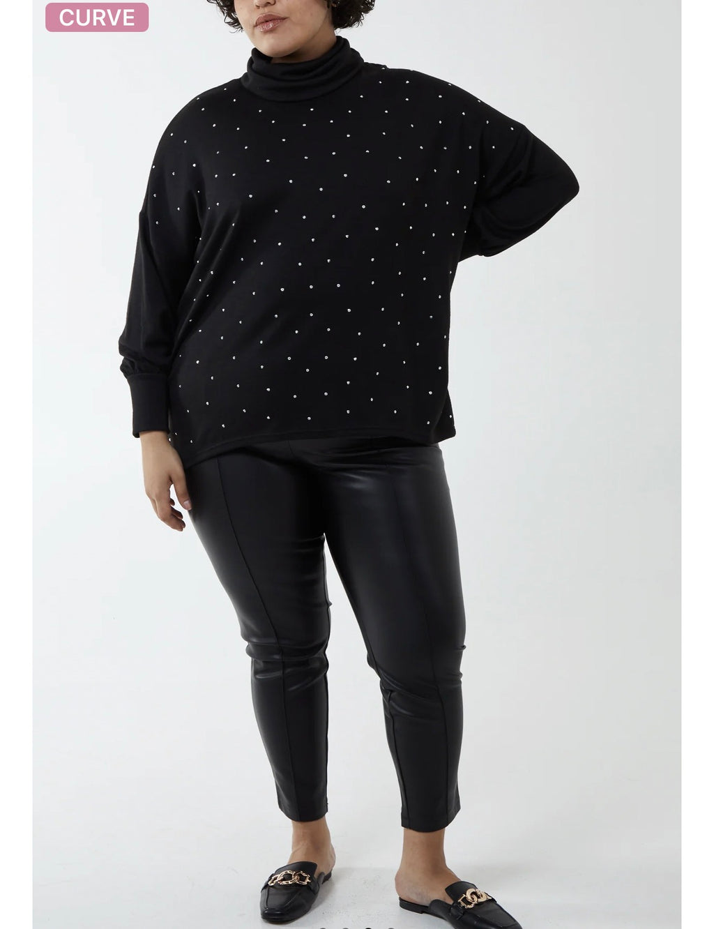 CURVE DIAMANTE ROLL NECK