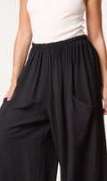 WIDE-LEG RELAXED TROUSERS WITH POCKETS